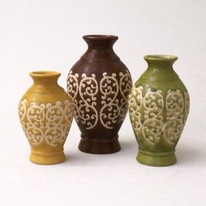 Set of 3 ceramic vases. Adorable with unique scroll design.